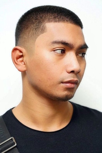 A buzz cut is a short, simple hairstyle for men that is easy to maintain.