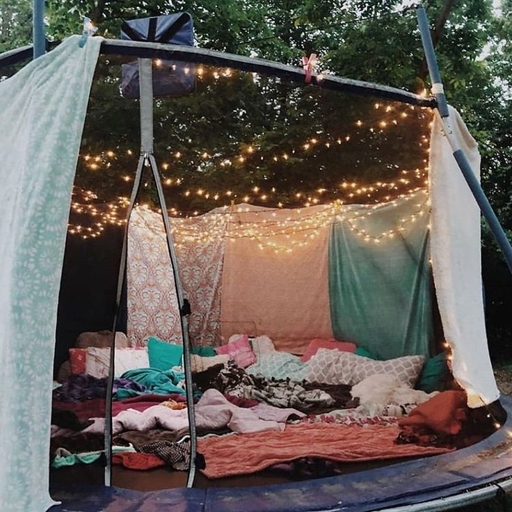 A romantic bohemian trampoline sleepover is the perfect way to spend a summer night with your loved one.