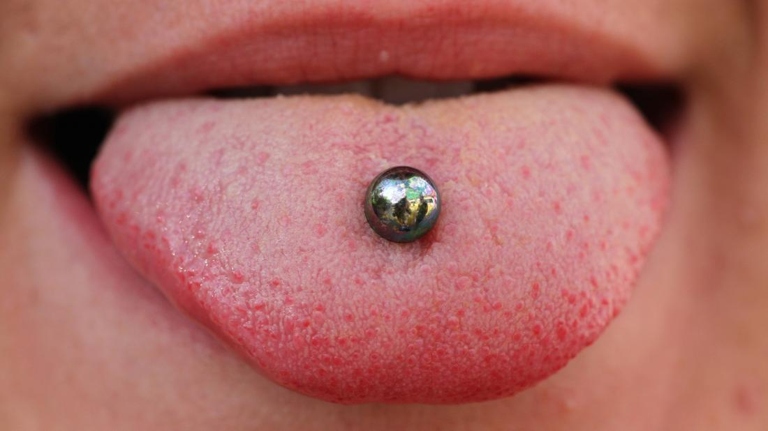A tongue piercing can take up to six weeks to heal and during that time you may experience some pain and swelling.