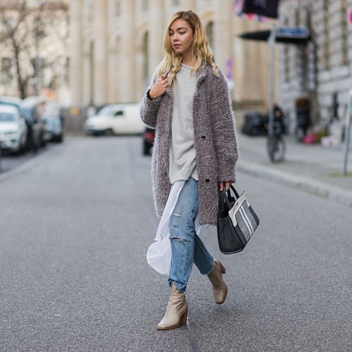 Boyfriend jeans are a relaxed and comfortable style of denim that can be worn in winter by pairing them with a chunky sweater and boots.