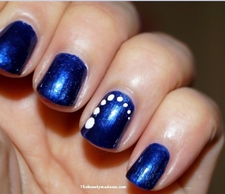 Finally, add some white stars with a dotting tool or toothpick. To do galaxy nails, start by painting your nails with a black base coat. Then, use a sponge to apply a gradient of colors, starting with a dark blue or purple and lightening as you go.