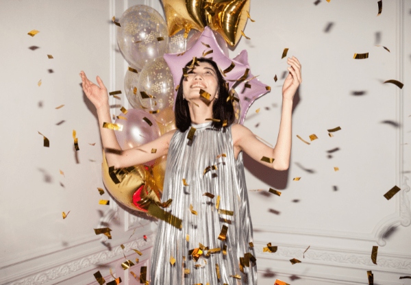For a 19th birthday celebration with a fun and festive atmosphere, consider a fancy robe and balloons photoshoot!