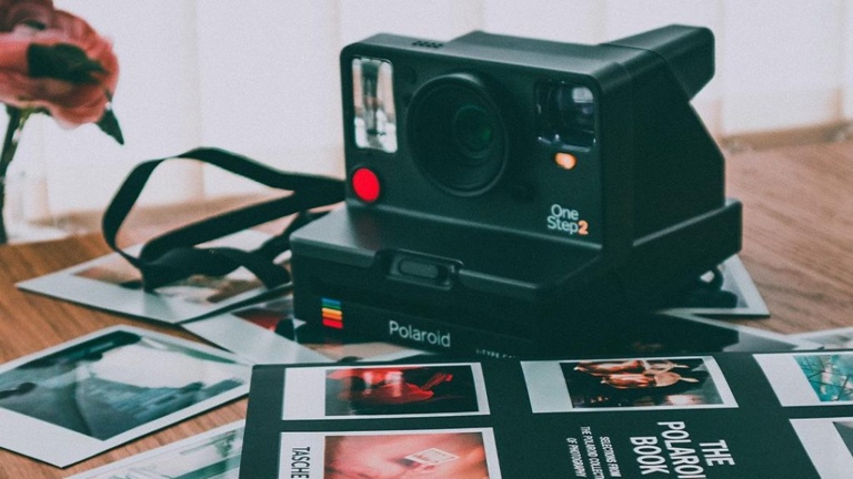 If you're looking for a fun activity to do with your friends, consider taking Polaroid pictures.