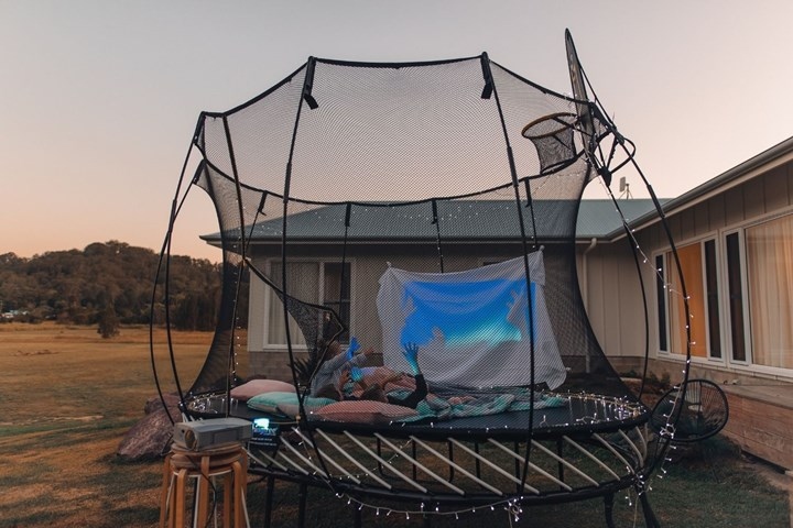 One fun trampoline sleepover idea is to spend some time stargazing.