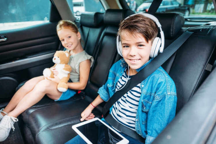Podcasts and audiobooks are great ways to keep tweens and teens entertained on a car trip.