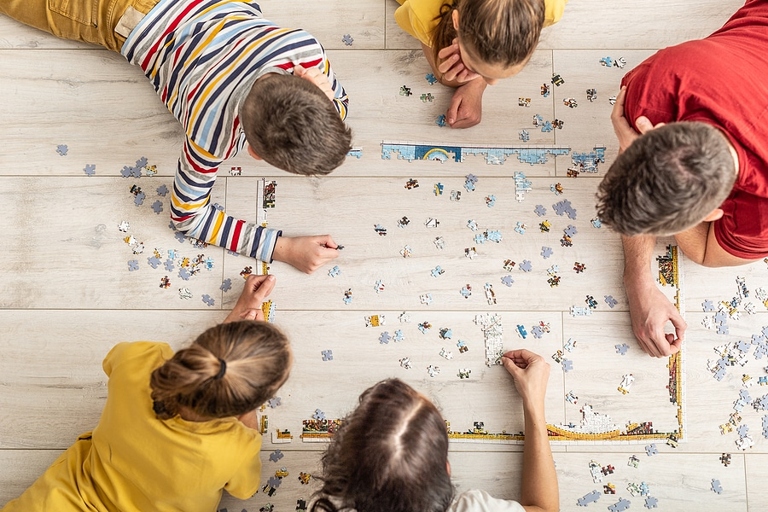 Puzzles are a great way for teens to bond and have fun together.