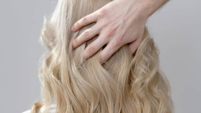 The general rule of thumb is to leave hair dye in blonde hair for no longer than 30 minutes.