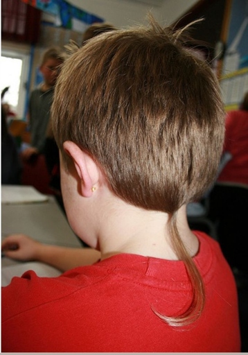 The rat-tail is a hairstyle that is often seen on teenage boys.