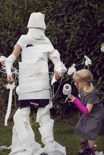 This Halloween, have a blast with your friends by competing in a plastic wrap mummy race!