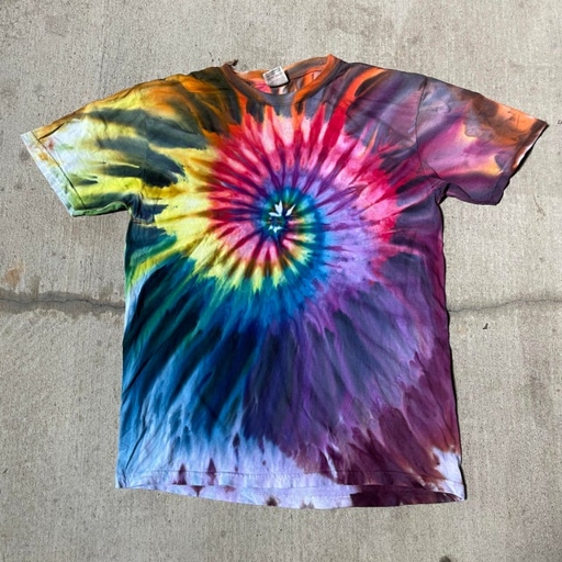 This tie dye technique is called vortex tie dye and it's done by bleaching the design into the fabric.