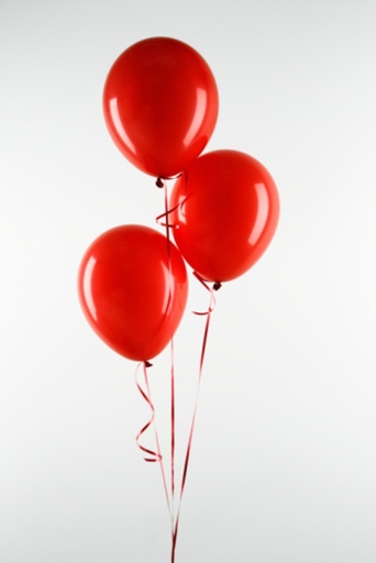 To keep helium balloons inflated for weeks, use a balloon weight to anchor the balloon to the ground.
