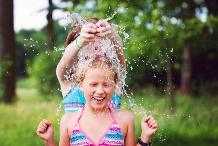 Water balloon toss is a classic summer pool game that is perfect for cooling off on a hot day.